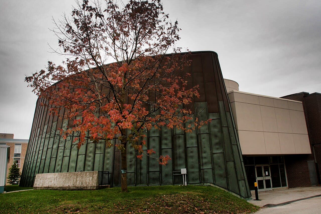 University of Waterloo campus in autumn — trees and academic buildings